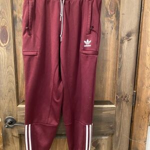Adidas Red Sweatpants with Three Stripes and Elastic Cuffs